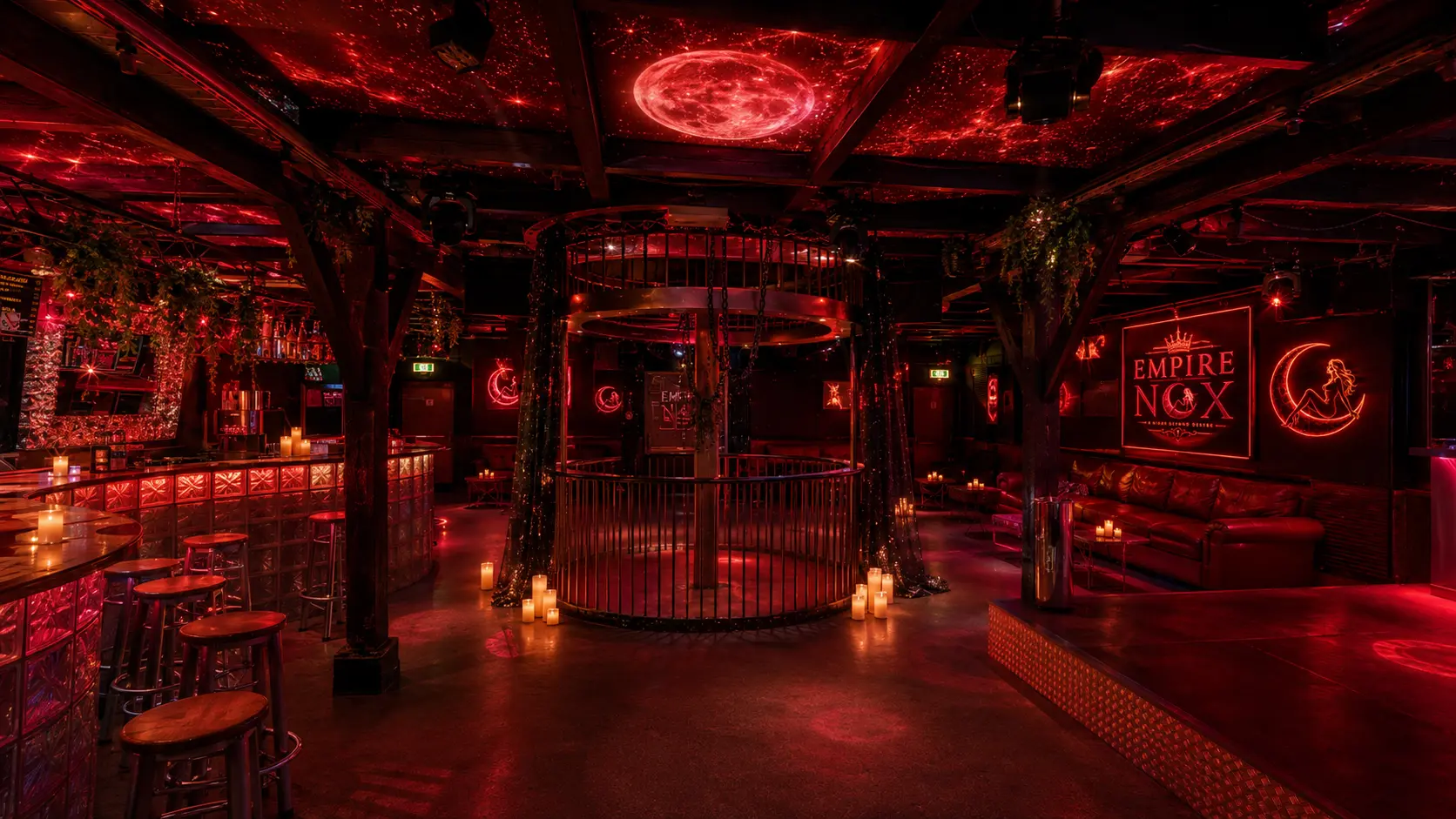 Red lit lounge with velvet seating inside Empire Nox